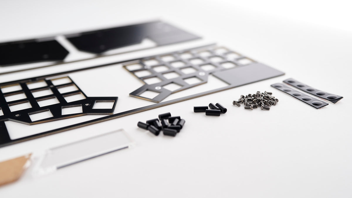 Corne DIY FR4 Case Kit parts laid out on white background, including acrylic screen covers, 8mm standoffs, 10mm standoffs, screws, and rubber bumpons.