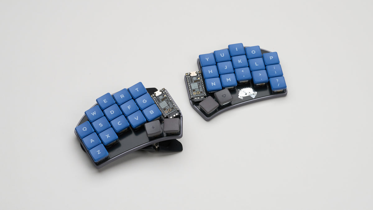 Crab Broom keyboard build with blue and black keycaps, shown from above